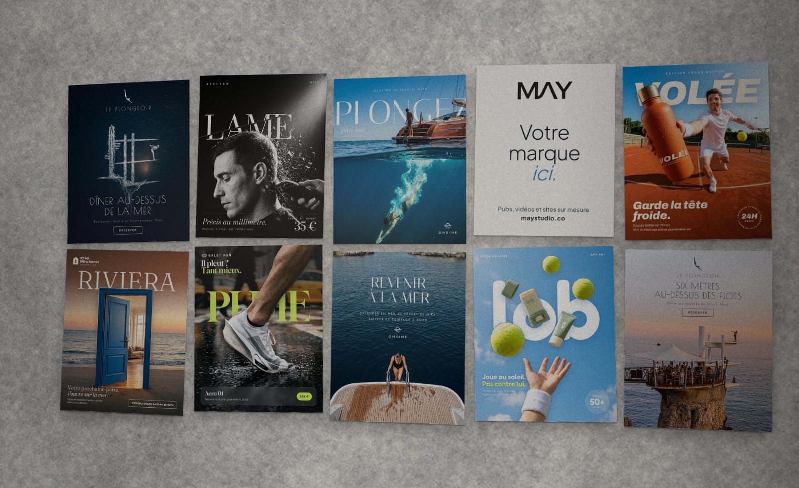 Mur d'affiches, avec une affiche blanche Votre marque ici au milieu des réalisations